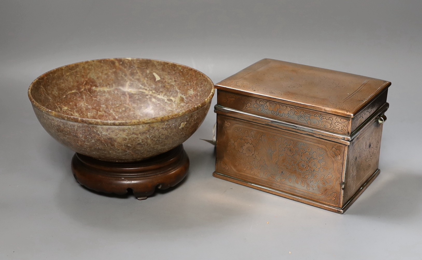 An Indo-Persian engraved copper plated tea caddy and Chinese soapstone bowl on stand. Diameter of bowl 20.5cm